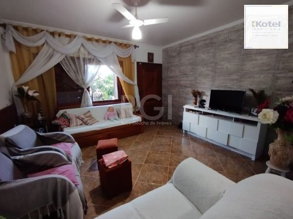 Casa em Porto Alegre, no bairro Hípica, com 3 dormitório(s), e 3 banheiros, à venda. — foto 5