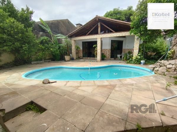 Casa em Porto Alegre, no bairro Ipanema, com 6 dormitório(s), e 6 banheiros, à venda. — foto 3