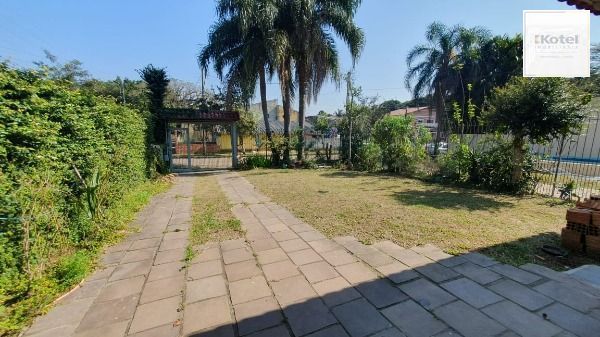 Casa em Porto Alegre, no bairro Espírito Santo, com 4 dormitório(s), e 4 banheiros, à venda. — foto 2
