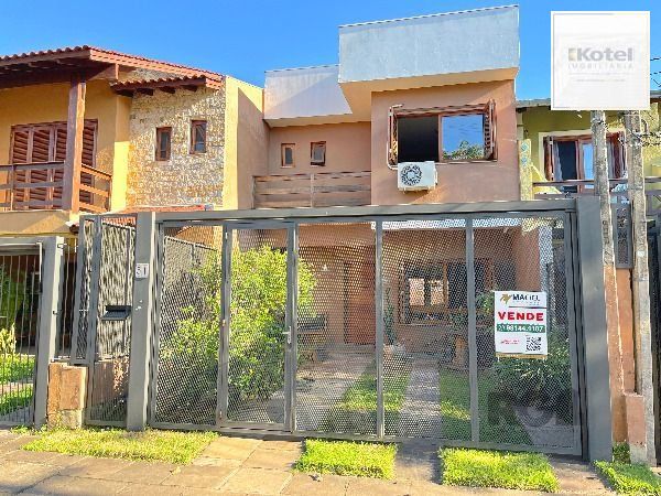 Casa em Porto Alegre, no bairro Hípica, com 3 dormitório(s), e 3 banheiros, à venda. — foto 2