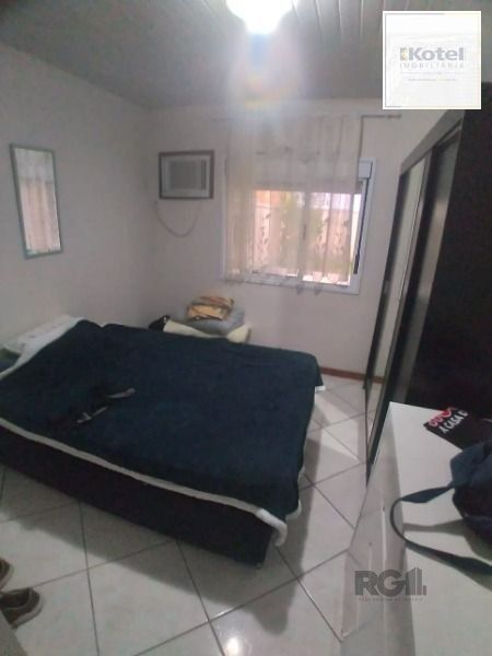 Casa em Porto Alegre, no bairro Hípica, com 2 dormitório(s), e 2 banheiros, à venda. — foto 5