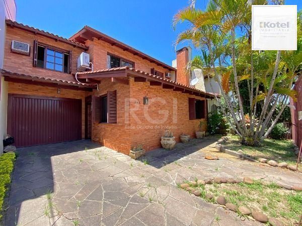 Casa em Porto Alegre, no bairro Ipanema, com 3 dormitório(s), e 3 banheiros, à venda. — foto 3