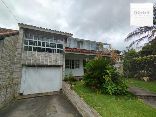 Casa em Porto Alegre, no bairro Ipanema, com 6 dormitório(s), e 6 banheiros, à venda. — foto 2