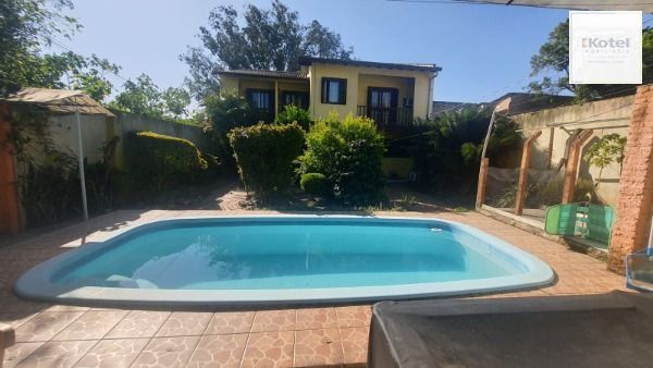 Casa em Porto Alegre, no bairro Nonoai, com 3 dormitório(s), e 3 banheiros, à venda. — foto 4