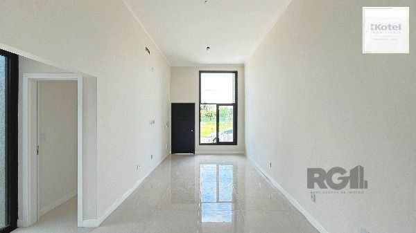 Casa Condominio em Porto Alegre, no bairro Hípica, com 3 dormitório(s), e 3 banheiros, à venda. — foto 3
