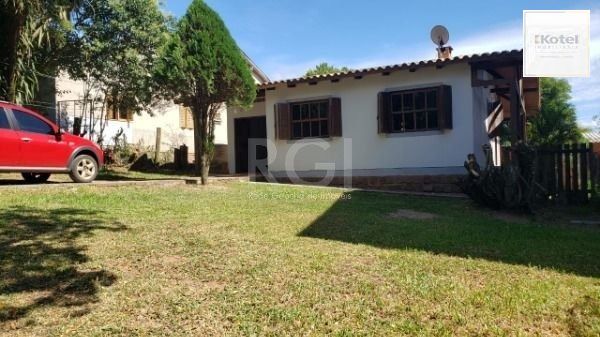 Casa em Porto Alegre, no bairro Hípica, com 2 dormitório(s), e 2 banheiros, à venda. — foto 3