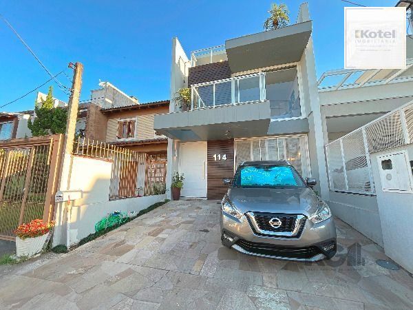 Casa em Porto Alegre, no bairro Hípica, com 3 dormitório(s), e 3 banheiros, à venda. — foto 2