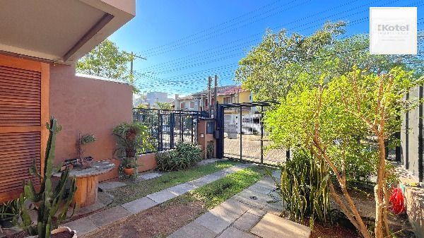 Casa em Porto Alegre, no bairro Hípica, com 3 dormitório(s), e 3 banheiros, à venda. — foto 3