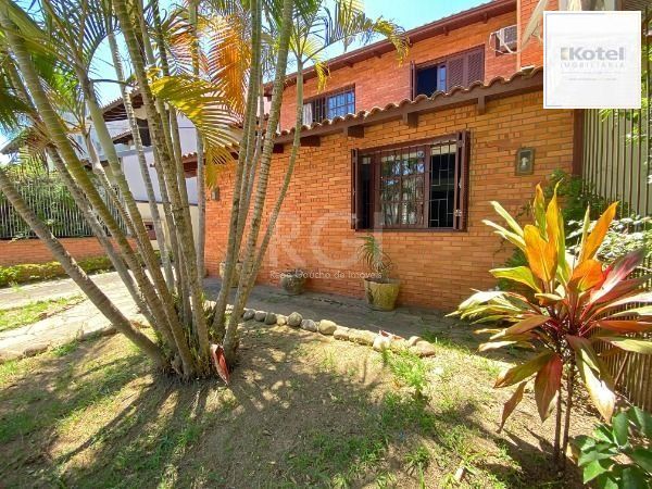 Casa em Porto Alegre, no bairro Ipanema, com 3 dormitório(s), e 3 banheiros, à venda. — foto 5