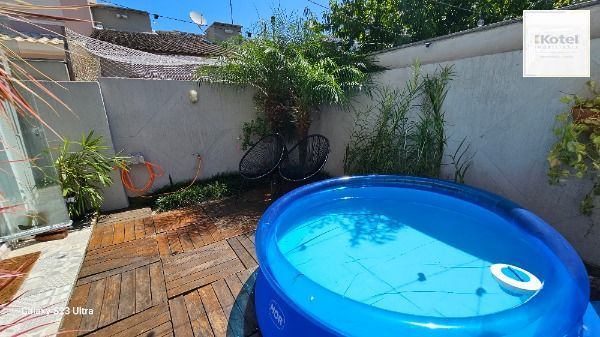 Casa em Porto Alegre, no bairro Hípica, com 3 dormitório(s), e 3 banheiros, à venda. — foto 5