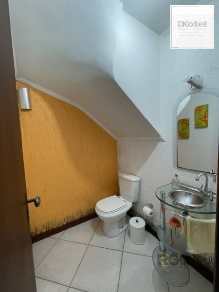 Casa em Porto Alegre, no bairro Hípica, com 3 dormitório(s), e 3 banheiros, à venda. — foto 4