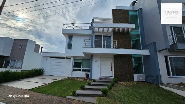 Casa em Porto Alegre, no bairro Hípica, com 3 dormitório(s), e 3 banheiros, à venda. — foto 2