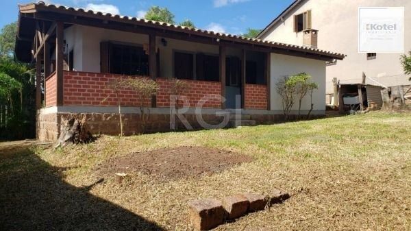 Casa em Porto Alegre, no bairro Hípica, com 2 dormitório(s), e 2 banheiros, à venda. — foto 2