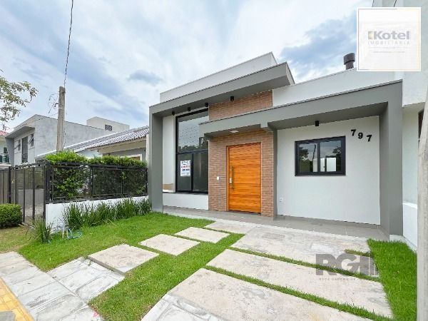 Casa em Porto Alegre, no bairro Hípica, com 3 dormitório(s), e 3 banheiros, à venda. — foto 3