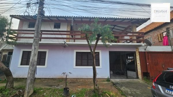 Casa em Porto Alegre, no bairro Hípica, à venda. — foto 2