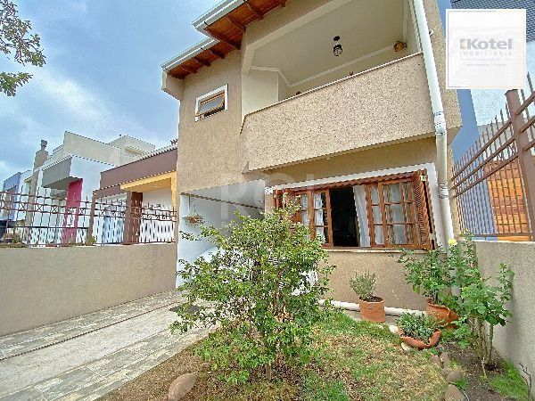 Casa em Porto Alegre, no bairro Hípica, com 3 dormitório(s), e 3 banheiros, à venda. — foto 4