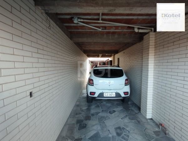 Casa em Porto Alegre, no bairro Hípica, com 3 dormitório(s), e 3 banheiros, à venda. — foto 4