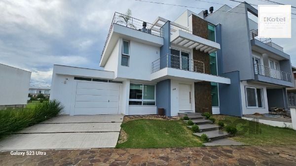 Casa em Porto Alegre, no bairro Hípica, com 3 dormitório(s), e 3 banheiros, à venda. — foto 3