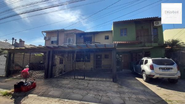 Casa em Porto Alegre, no bairro Hípica, com 3 dormitório(s), à venda. — foto 3