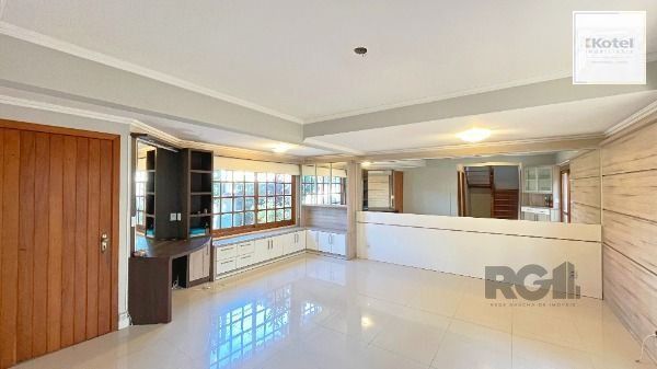 Casa em Porto Alegre, no bairro Espírito Santo, com 3 dormitório(s), e 3 banheiros, à venda. — foto 5