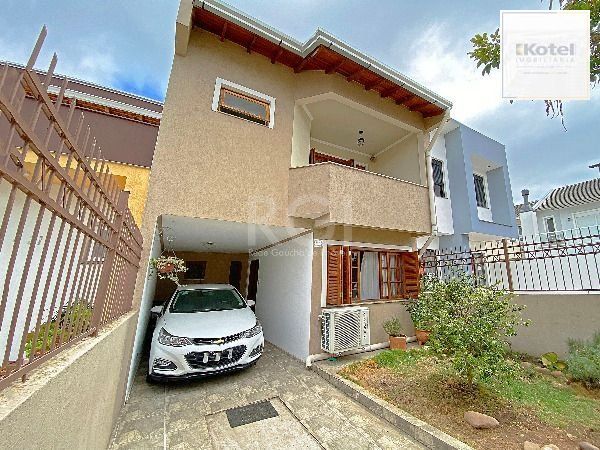 Casa em Porto Alegre, no bairro Hípica, com 3 dormitório(s), e 3 banheiros, à venda. — foto 2