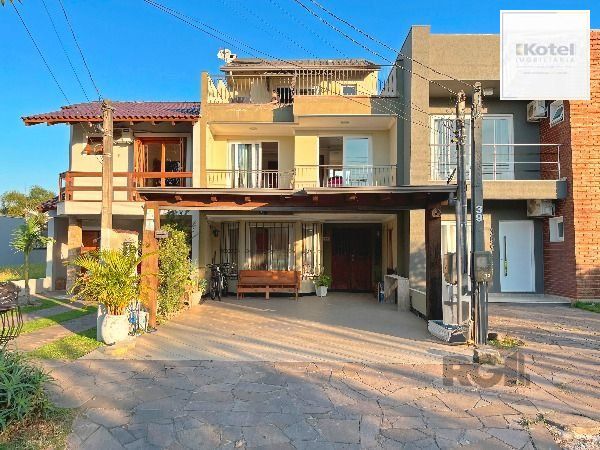 Casa em Porto Alegre, no bairro Hípica, com 3 dormitório(s), e 3 banheiros, à venda. — foto 2