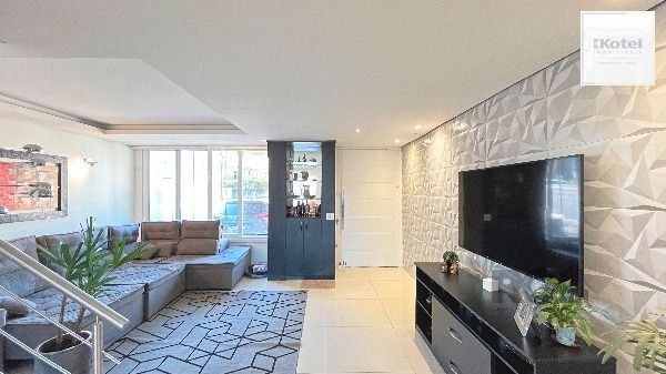 Casa em Porto Alegre, no bairro Hípica, com 3 dormitório(s), e 3 banheiros, à venda. — foto 5