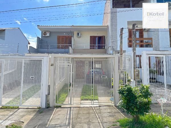 Casa em Porto Alegre, no bairro Guarujá, com 2 dormitório(s), e 2 banheiros, à venda. — foto 2