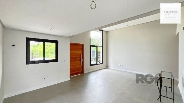 Casa em Porto Alegre, no bairro Hípica, com 3 dormitório(s), e 3 banheiros, à venda. — foto 5