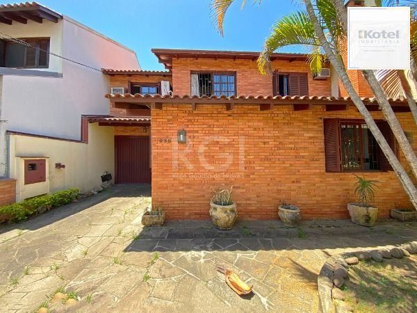 Casa em Porto Alegre, no bairro Ipanema, com 3 dormitório(s), e 3 banheiros, à venda. — foto 4