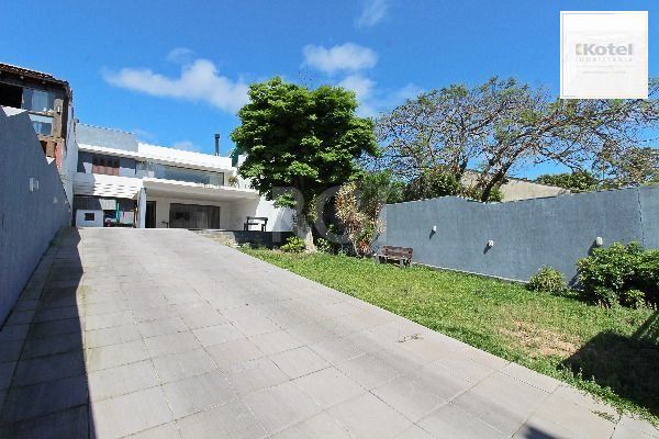 Casa para Venda - 400m², 4 dormitórios, sendo 2 suites, 4 vagas - Guarujá — foto 3
