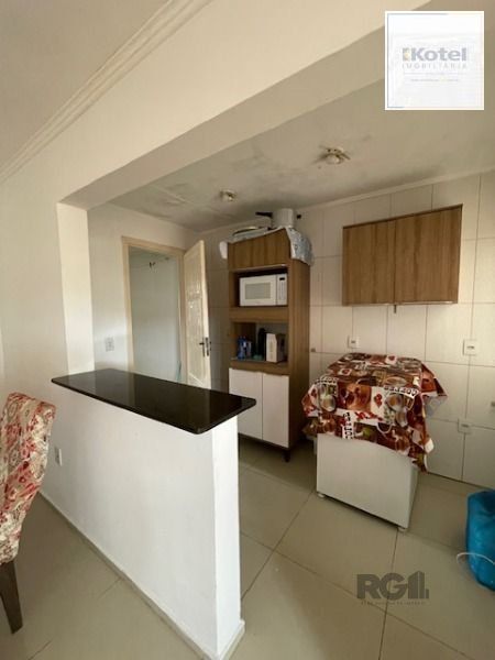 Casa em Porto Alegre, no bairro Hípica, com 2 dormitório(s), e 2 banheiros, à venda. — foto 4