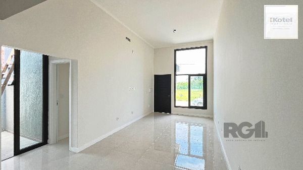 Casa Condominio em Porto Alegre, no bairro Hípica, com 3 dormitório(s), e 3 banheiros, à venda. — foto 2