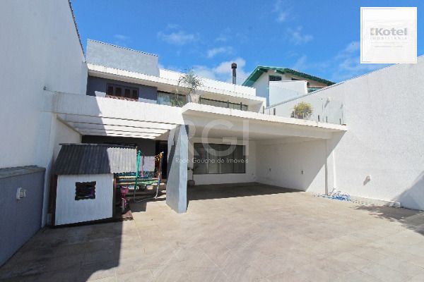 Casa para Venda - 400m², 4 dormitórios, sendo 2 suites, 4 vagas - Guarujá — foto 2