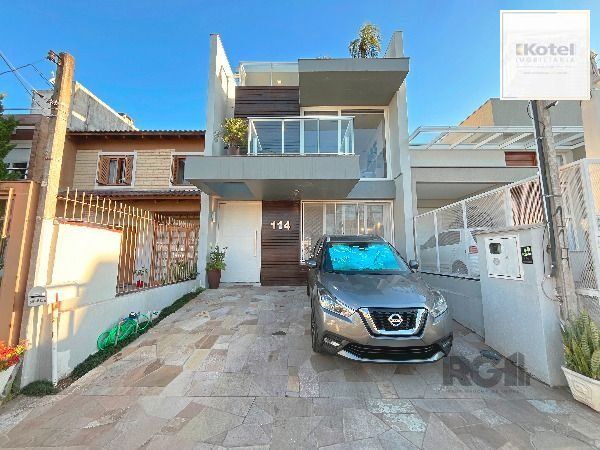 Casa em Porto Alegre, no bairro Hípica, com 3 dormitório(s), e 3 banheiros, à venda. — foto 3