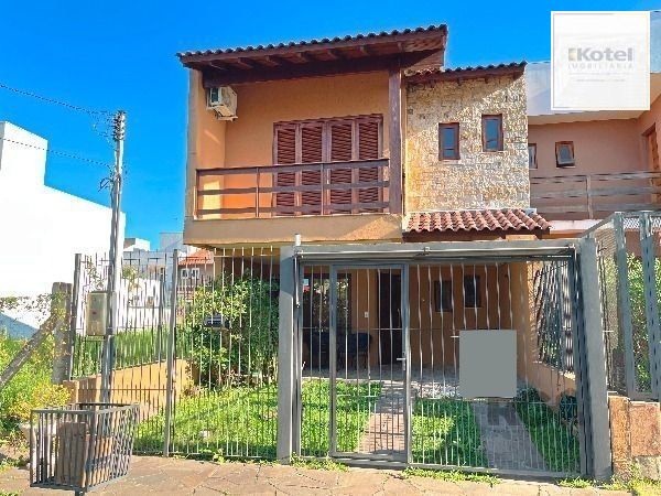 Casa em Porto Alegre, no bairro Hípica, com 3 dormitório(s), e 3 banheiros, à venda.