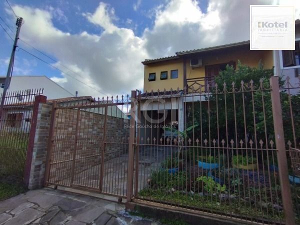 Casa em Porto Alegre, no bairro Hípica, com 3 dormitório(s), e 3 banheiros, à venda. — foto 2