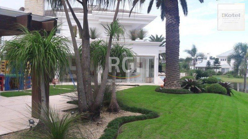 Casa para Venda - 728.71m², 6 dormitórios, sendo 6 suites, 3 vagas - Atlântida