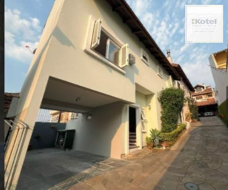 CASA EM CONDOMÍNIO - 3 DORMITÓRIOS - SUITE - 2 VAGAS - VILA CONCEIÇÃO - POA RS