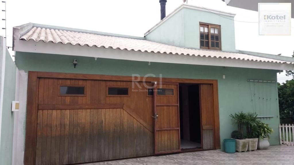 Casa com 3 dormitórios à venda, 230,11 m² por R$ 900.000,00 - Igara III - Canoas/RS