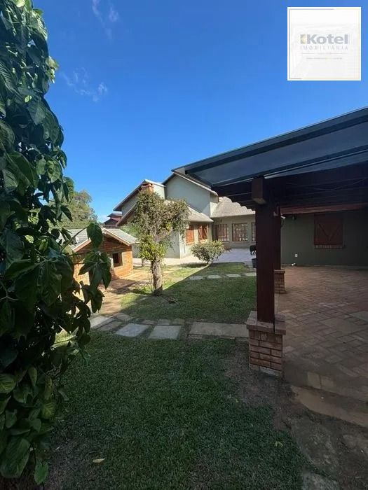 Residência de Luxo em Condomínio Fechado com 4 Dormitórios, 3 Suítes e Área de Lazer Privativa – São Lucas, Viamão/RS