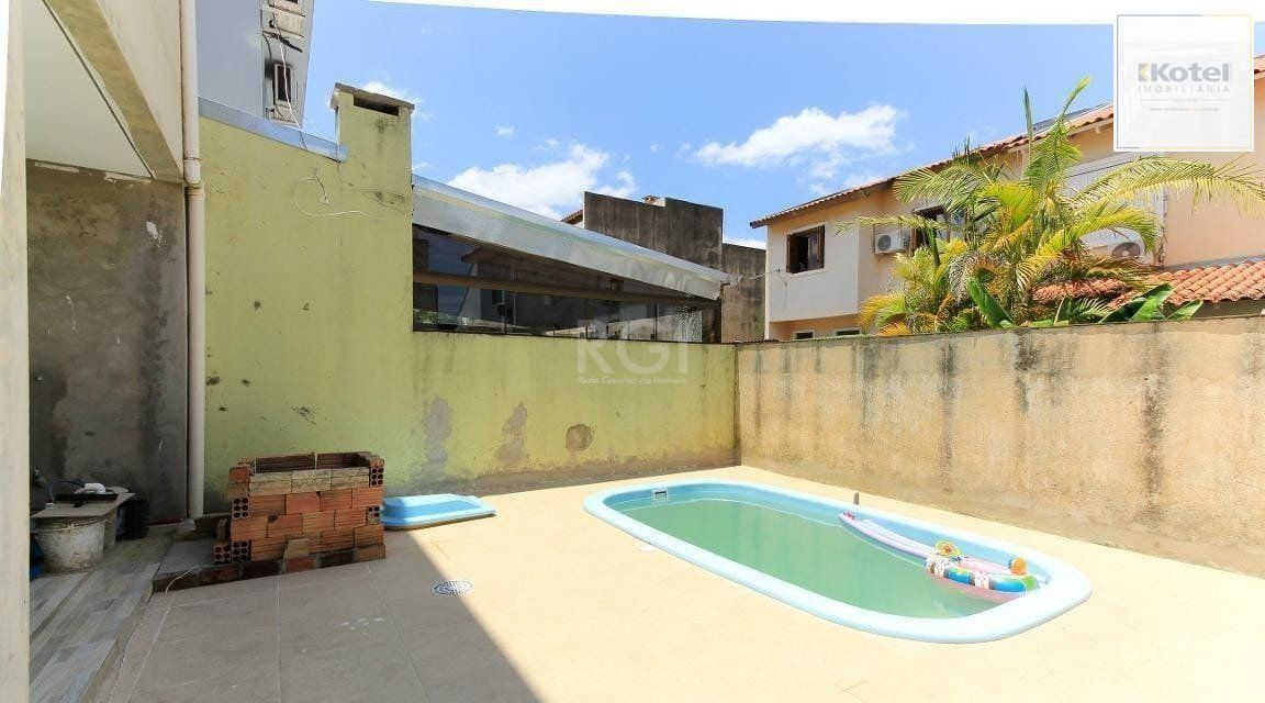 Casa no bairro Hípica - 3 dormitórios — foto 3