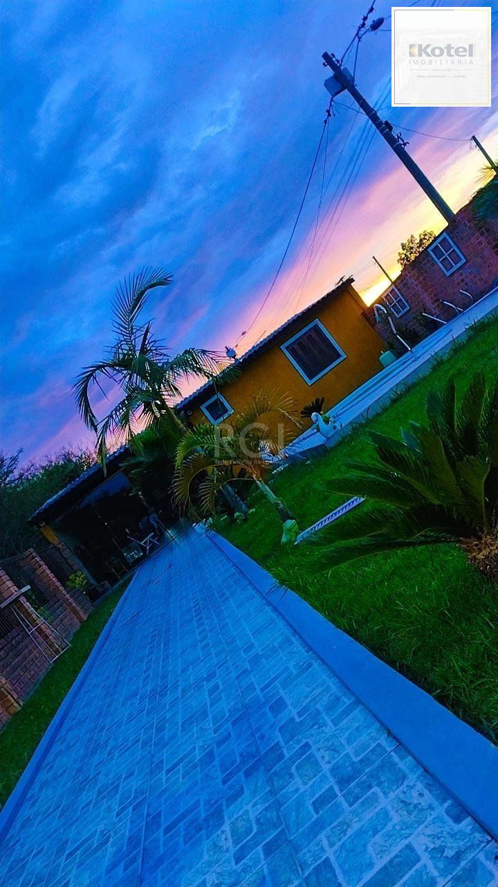 Casa com Piscina no bairro Lami — foto 3