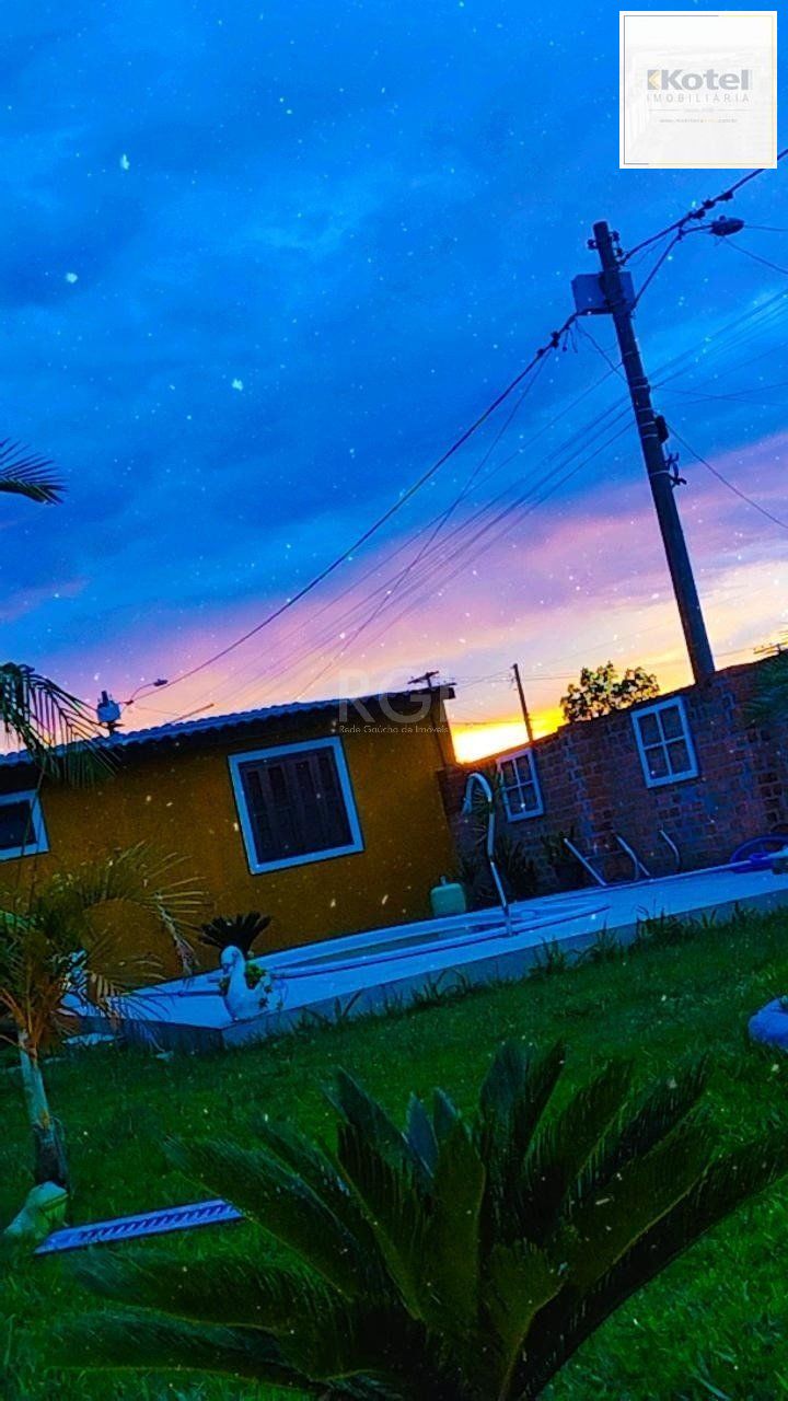 Casa com Piscina no bairro Lami — foto 4