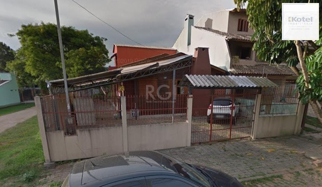 Casa de esquina no bairro Guarujá — foto 3