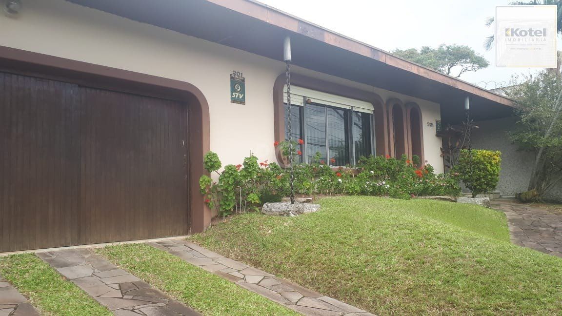 Casa com 4 dormitórios no Bairro Guarujá — foto 2