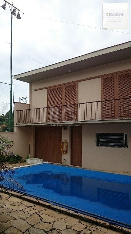 Casa com 4 dormitórios no Bairro Guarujá — foto 5