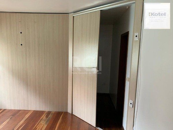 Casa no bairro Jardim Botânico de 3 dormitórios — foto 4