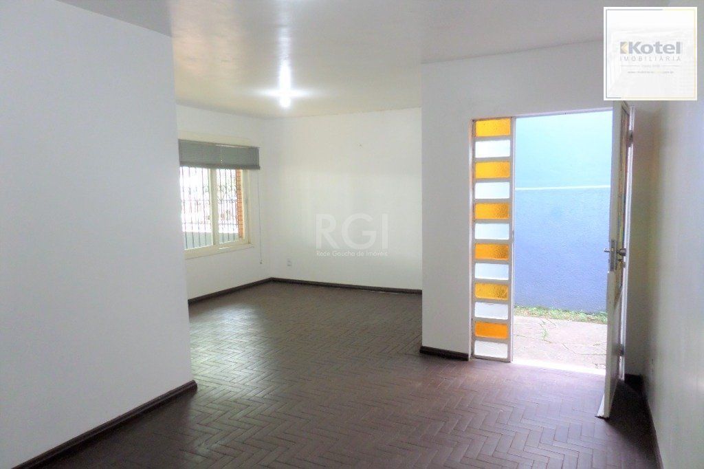 Casa no bairro Jardim Botânico de 3 dormitórios e 2 vagas