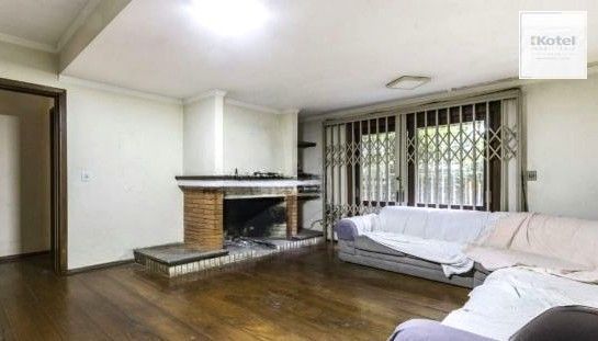 Casa sobrado no bairro Auxiliadora de 5 dormitórios e 4 vagas — foto 5